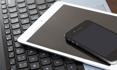 Laptop, mobile and tablet on the table